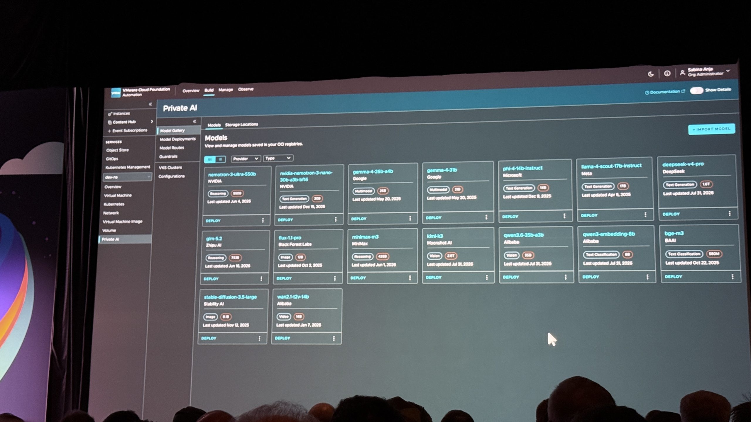 Screenshot of the VCF Automation Private AI model gallery showing model cards for Nemotron, Gemma, Phi, Llama, DeepSeek, GLM, Kimi, Qwen and others